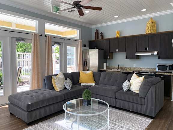 Modern sectional sofa with open concept kitchen at Liberty Hill Apartments, Draper, 84020