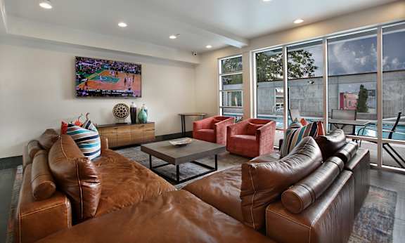 Living room with couch and ceiling lights