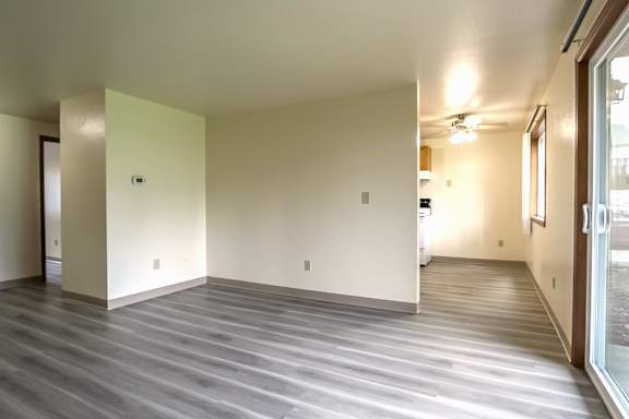 A room with a LVP floor and white walls.