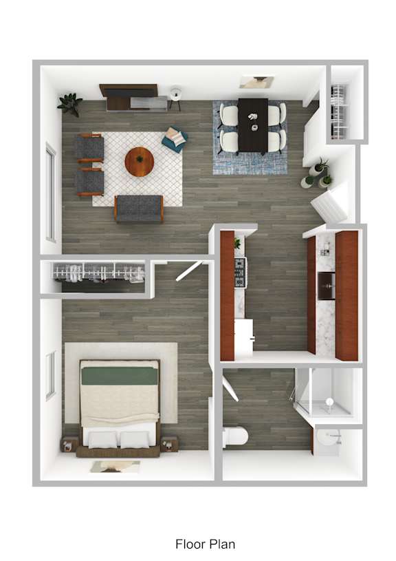 A floor plan of a small apartment with a bedroom, living room, and kitchen.