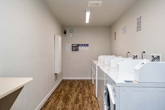 A laundry room with a washer and dryer.