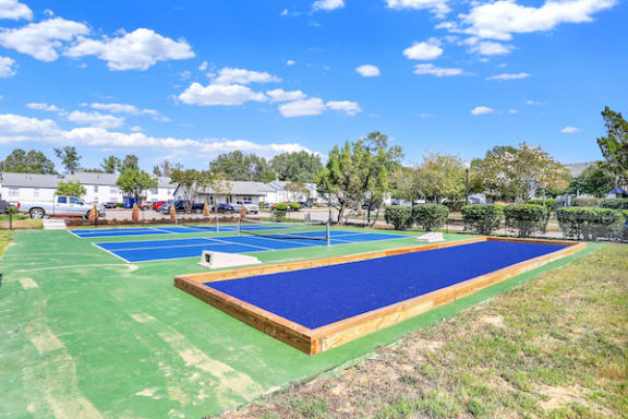 bocce ball, corn hole, and pickleball courts at Rock Creek Apartments for rent in Cordova, TN