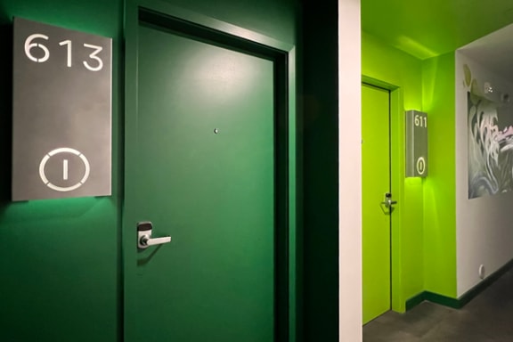 smart locks on the doors of individual residences on the green floor at Citizen Birmingham