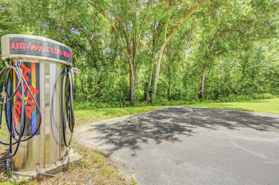 Carwash station with vacuum station and native surrounding landscape