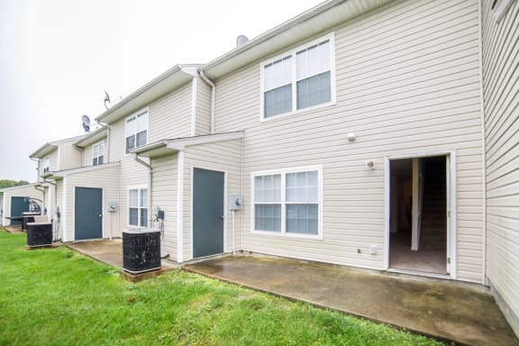 Building Exterior back yard with access to apartment
