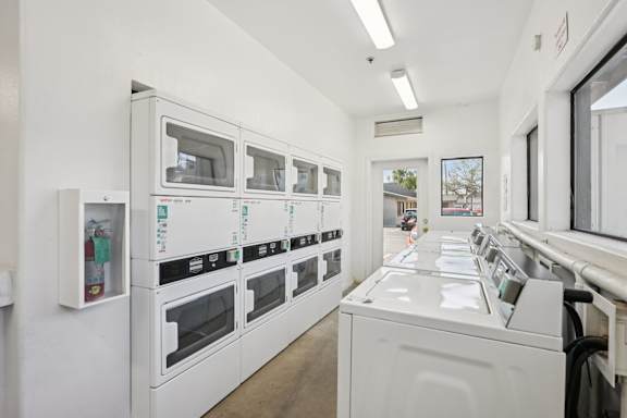 A row of washers and dryers