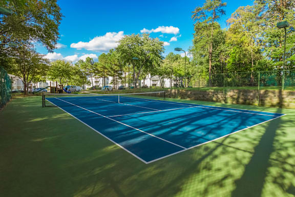 Smooth And Well Kept Tennis Court at Bridges at Mallard Creek Apartment Homes, Charlotte, 28269