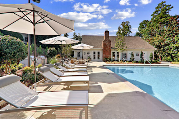 Poolside Relaxing Chairs at Caveness Farms Apartments, North Carolina