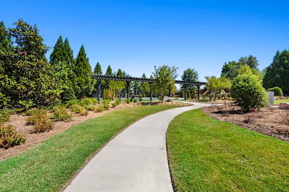 Green Space Walking Path at Caveness Farms Apartments, Wake Forest North Carolina