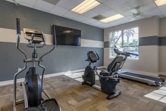 Fitness Center with Exercise Equipment  and TV