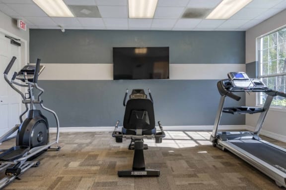 Fitness Center with Exercise Equipment  and TV