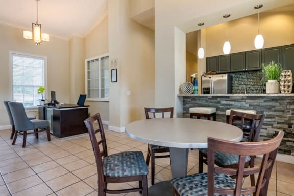 Clubhouse kitchen with breakfast bar and cafe style seating