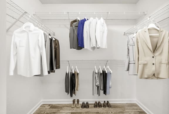 Virtually staged walk-in closet with carpet flooring