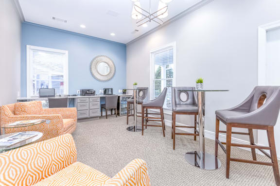 the reserve at bucklin hill leasing office with couches and chairs