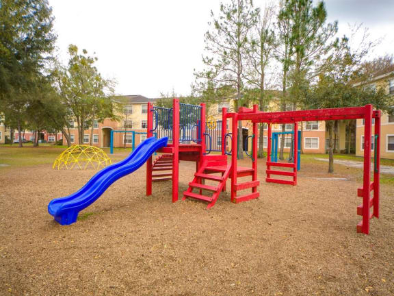 Outdoor Playground Area at Leigh Meadows Apartments, Jacksonville, FL, 32257