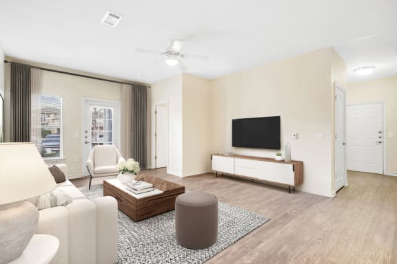 a living room with hardwood floors