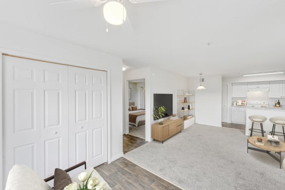 a living room and kitchen in a 555 waverly unit