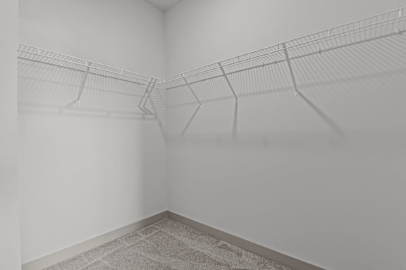 Empty room with a wire shelving unit at Litchford 315 Apartments, Raleigh, 27615