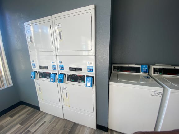 Laundry Center with side by side washers and stackable dryers