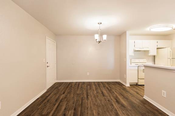 A dining room with wooden floors