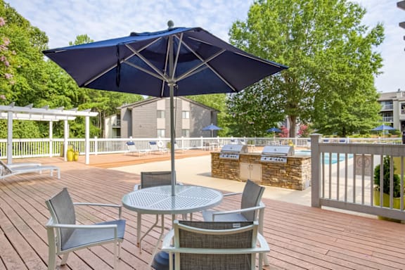 Outdoor Patio And Grill at The Parke at Trinity Apartment Homes, North Carolina
