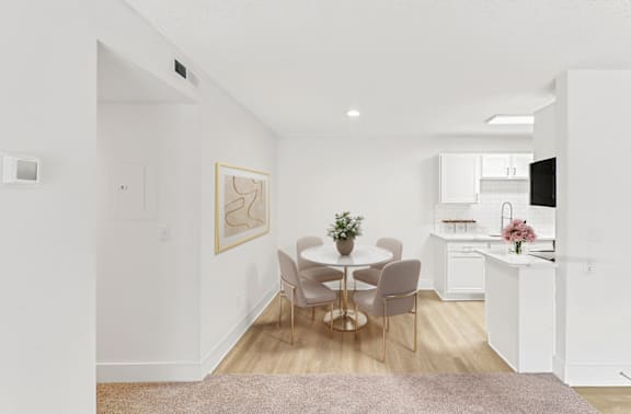 a kitchen and dining area  at The Parke at Trinity Apartment Homes, Raleigh, NC, 27607