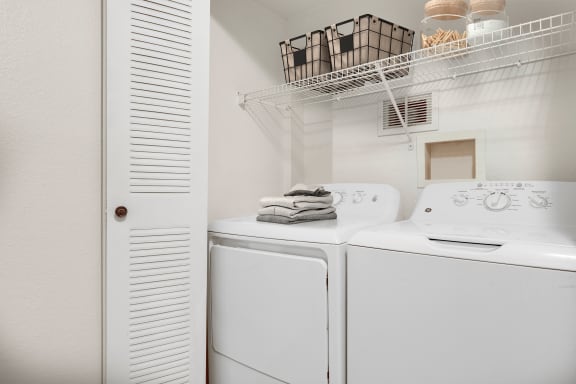 a washer and dryer in the laundry room