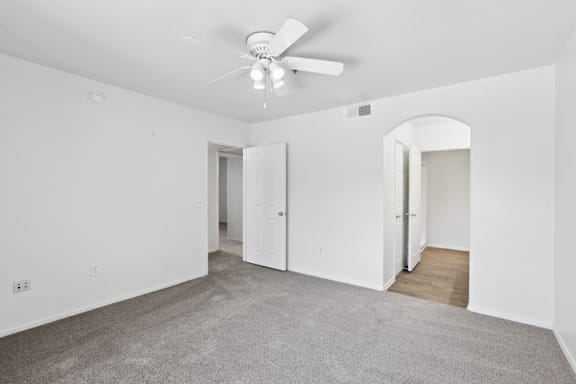 empty white room with two door at The Village at Sun Valley Apartments, Mesa, AZ 85207