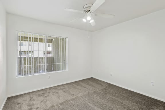 Grey floor with large window at The Village at Sun Valley Apartments, Mesa Arizona