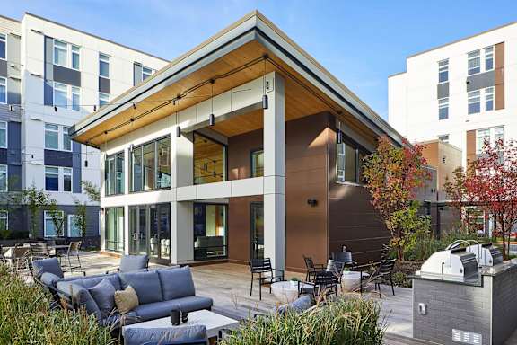 Outdoor Terrace with Ping Pong & BBQs at Postmark Apartments, Shoreline, WA 98155