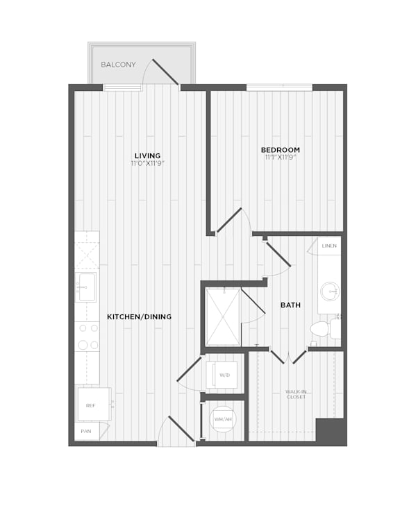 A floor plan of an apartment with a living room, kitchen/dining area, and two bedrooms.