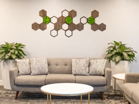 a living room with a couch and a table at The Aspen, Virginia, 22305