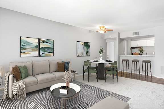 a living room with a couch and a table at Lakes Edge Apartments, Greensboro, North Carolina