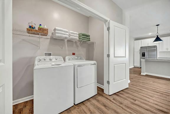 A laundry room with a washer and dryer.