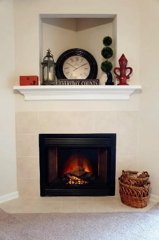 Fire place decor at Village on the Lake Apartments, Spring Lake