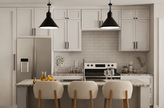 A kitchen with white cabinets and a marble countertop.at The Landings at Hard Scrabble, Columbia, SC