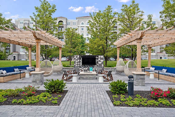 A park with a stage and seating area.