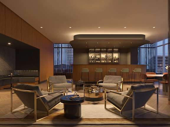 A modern living room with a large window and a view of the city.