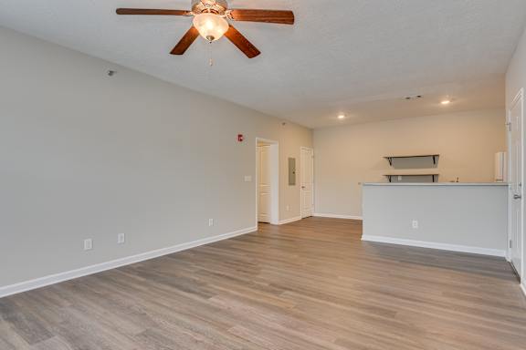 Kitchen and living room area at The Vista Apartments &amp; Townhomes, Warrenville, South Carolina