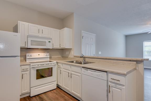 Kitchen with white appliances at The Vista Apartments &amp; Townhomes, South Carolina, 29851