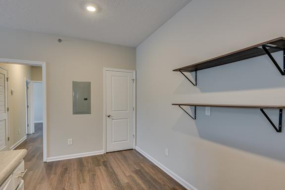 Kitchen and door to pantry at The Vista Apartments &amp; Townhomes, Warrenville, SC