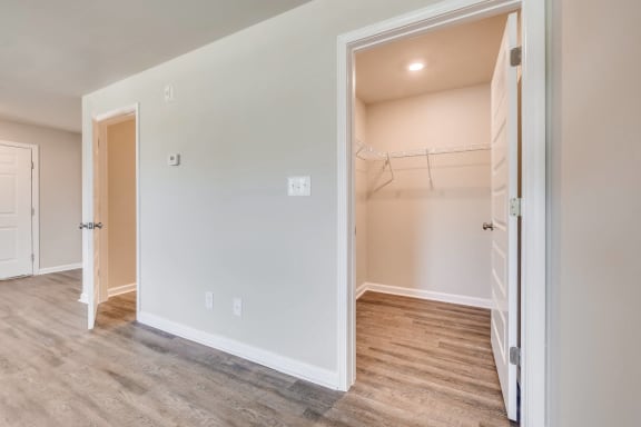 Large closet with wire shelving inside studio apartment at MacArthur Park, Augusta
