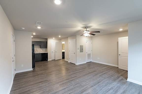 Living room with ceiling fan at The Vista Apartments &amp; Townhomes, South Carolina, 29851