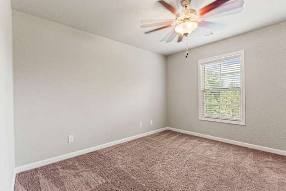 Layered modern room with patterned carpet at The Vista Apartments &amp; Townhomes, Warrenville, 29851