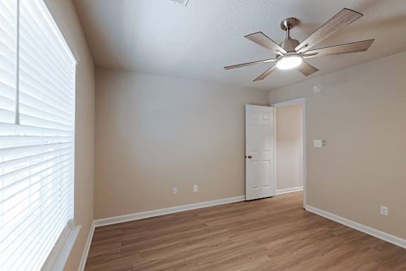 Radiant bright room with ceiling fan at Sanctuary Apartments and Townhomes, Augusta Georgia