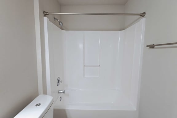 Eye-catching modern bathroom with bathtub view at Sanctuary Apartments and Townhomes, Georgia