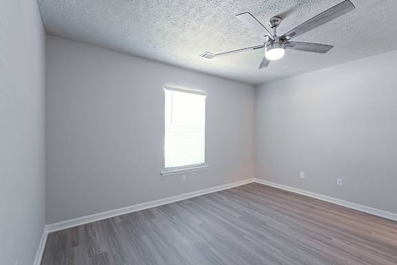 Brown pattern floor in a room at Sanctuary Apartments and Townhomes, Augusta Georgia