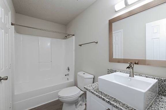 White sink and spacious tabs in bathroom at Sanctuary Apartments and Townhomes, Georgia, 30909