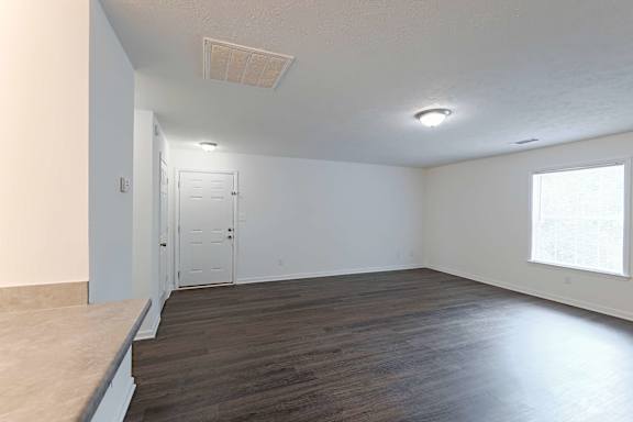 Glossy modern room with light reflections at Sanctuary Apartments and Townhomes, Augusta, GA 30909