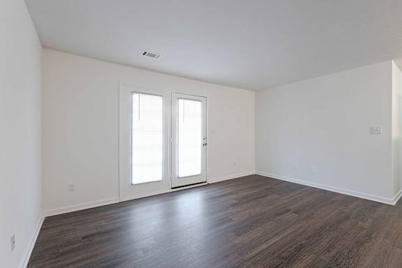 Room with sliding door  at Sanctuary Apartments and Townhomes, Augusta, 30909